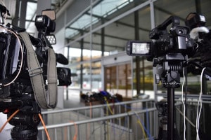 Photo of press video cameras