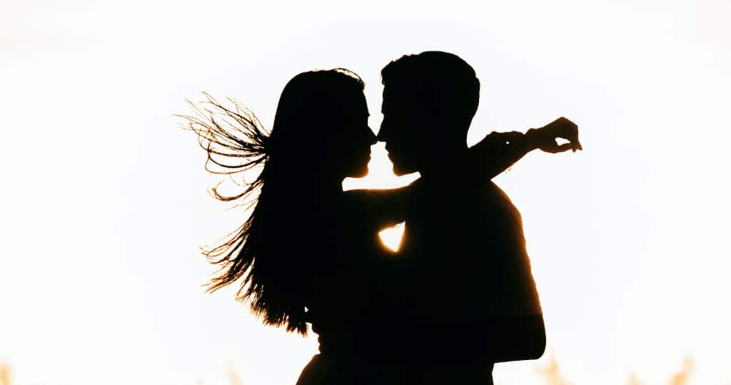 A thin line Couple embracing