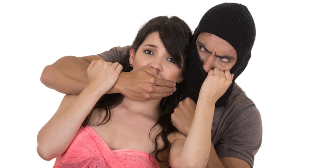 man assaulting woman